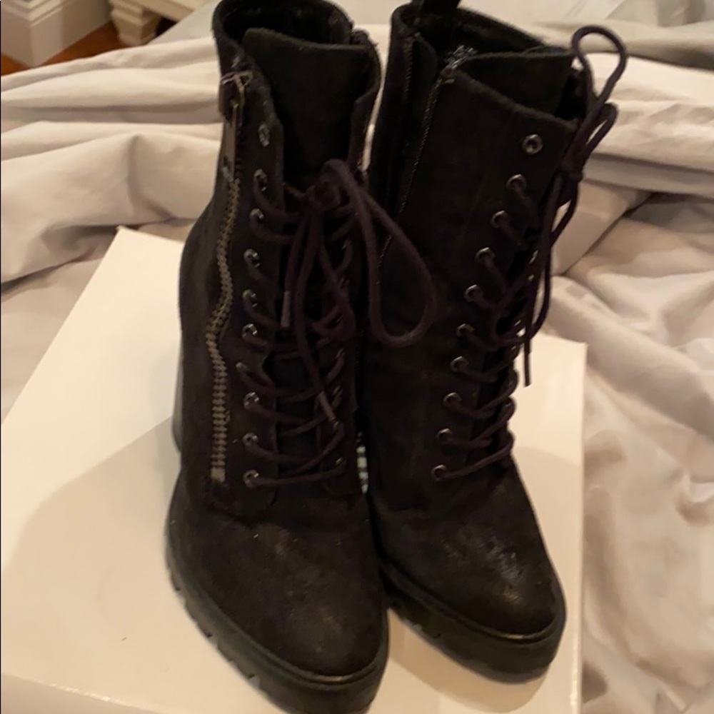 Black ankle boots with zippers
